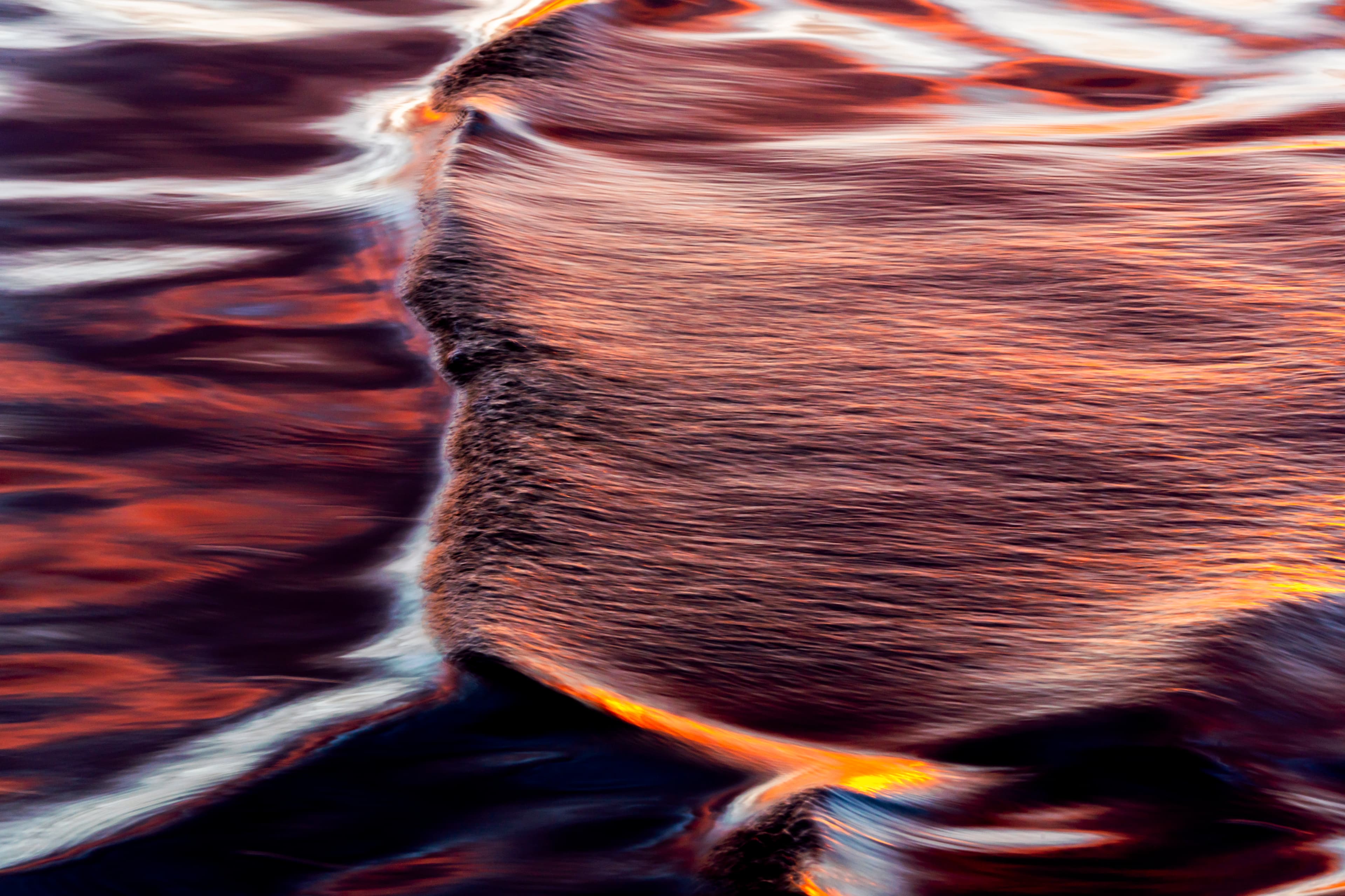 Deep crimson and black abstract wave study — fine art ocean photography print, Whangamata NZ.